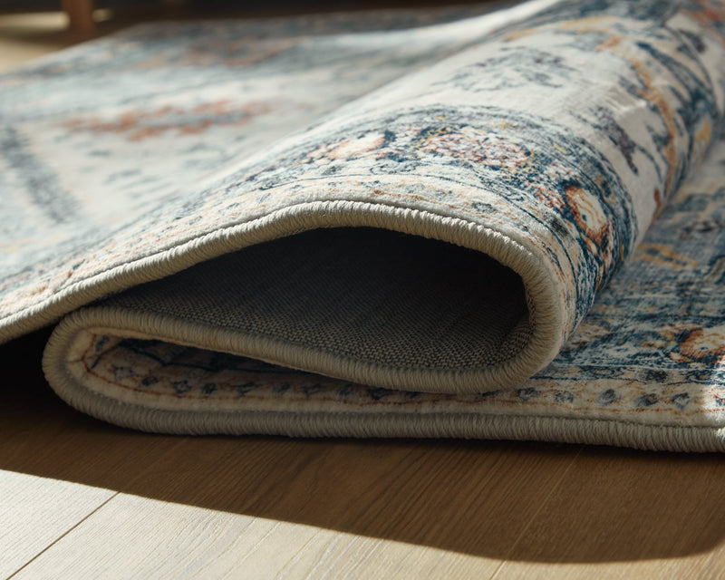 Wallney Area Rug